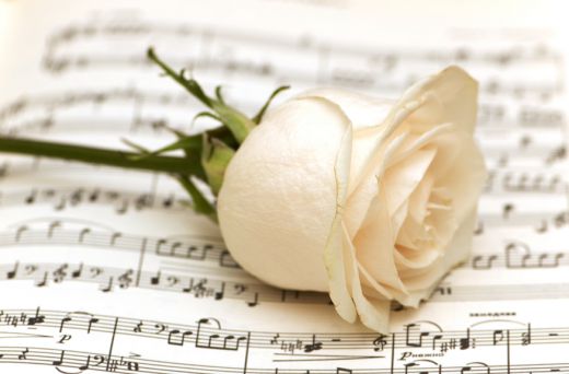 image of a rose on sheet music